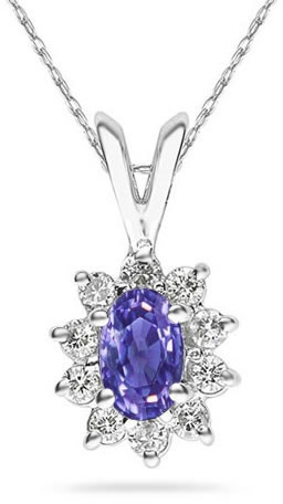 6mm x 4mm Oval Shaped Tanzanite and Diamond Flower Pendant in 14K White Gold