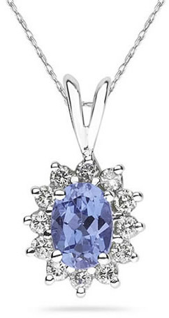 7mm x 5mm Oval Shaped Tanzanite and Diamond Flower Pendant in 14K White Gold