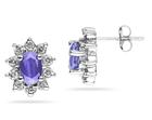 6mm x 4mm Oval Shaped Tanzanite and Diamond Flower Earrings in 14k White Gold