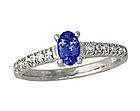 Carved Tanzanite and 1/4 Carat Diamond Ring - 14K White Gold