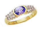 14K Gold Tanzanite and 1/4 Carat Diamond Half Bezel Ring