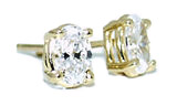 .25 Carat Oval Diamond Stud Earrings in 14k Yellow Gold