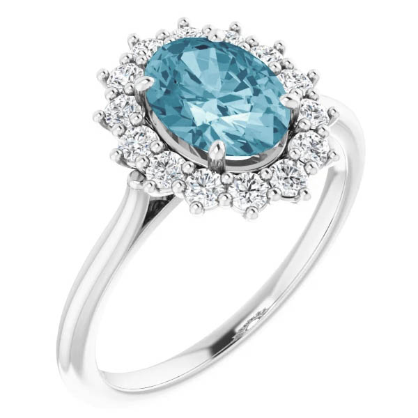 1.15 carat oval aquamarine and 1/3 carat diamond halo ring