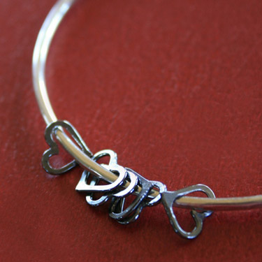 Besos Bangle XO in Sterling Silver